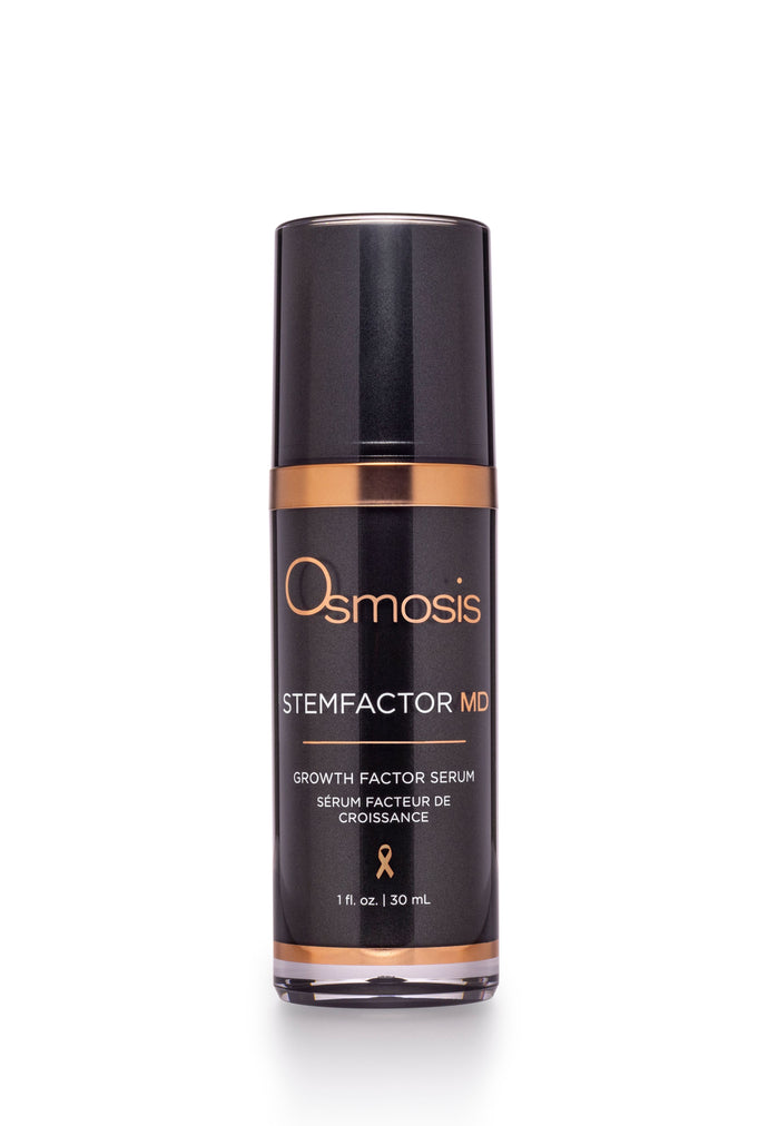 Black bottle of md advance stemfactor growth serum by osmosis is displayed on a white background