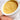 close up of tropical mango exfoliant in jar