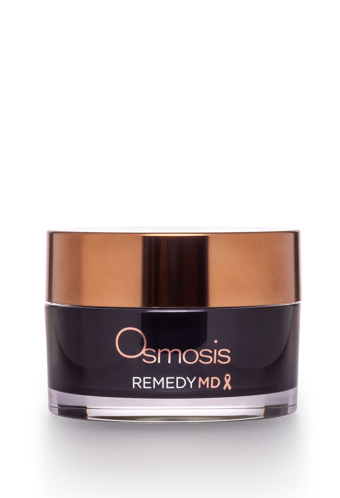 Black jar of md advanced remedy healing balm by osmosis is displayed on a white background