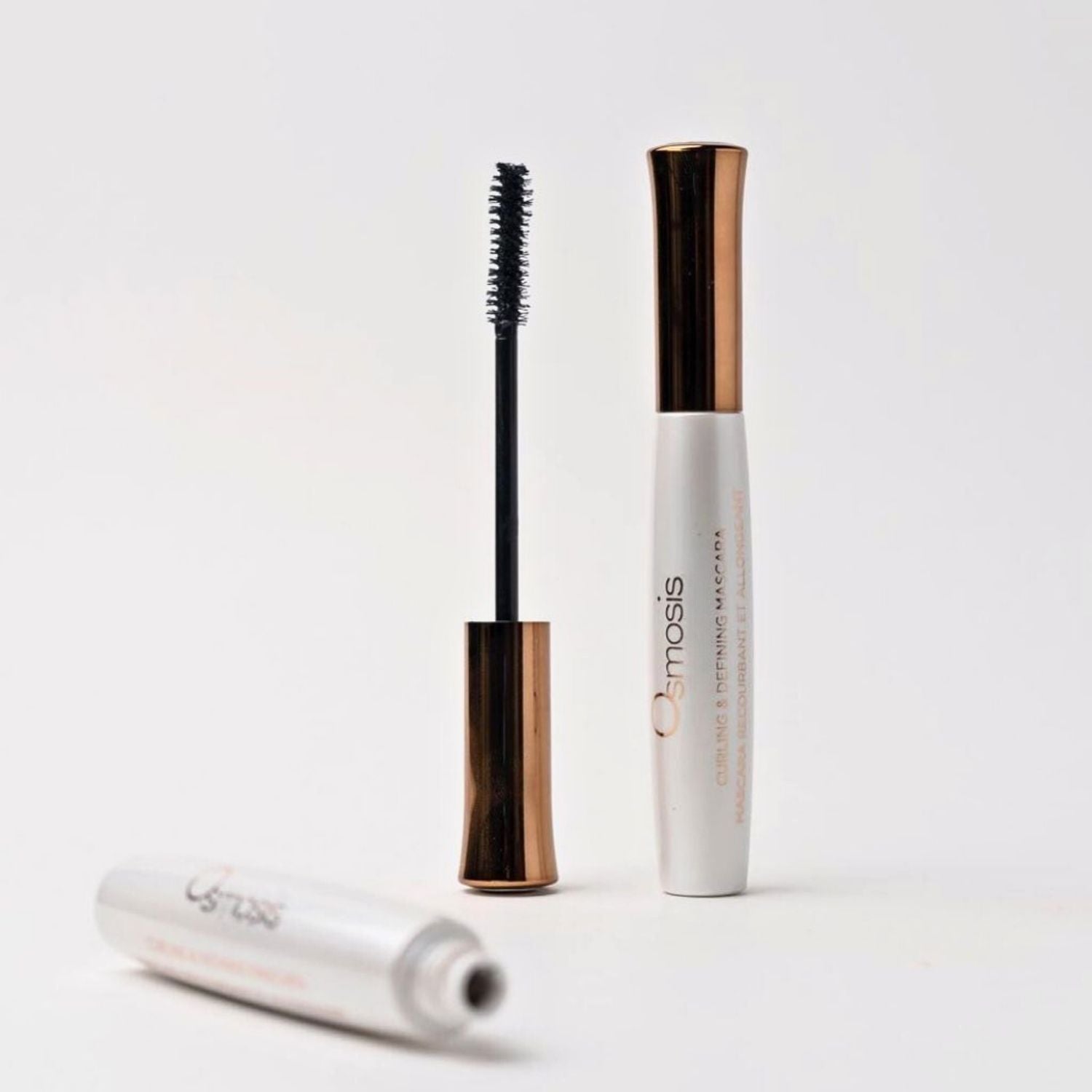 standing mascara open displayed on white background