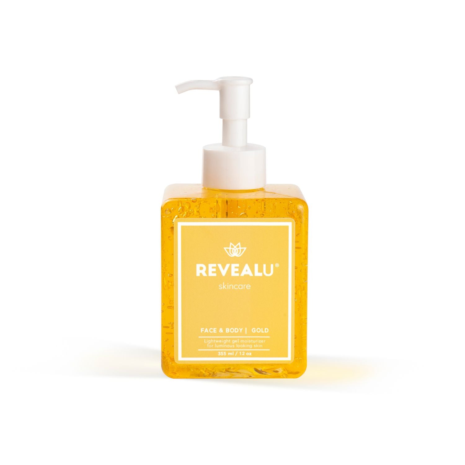 Bottle with pump of revealu face and body gold professional skincare displayed on white background