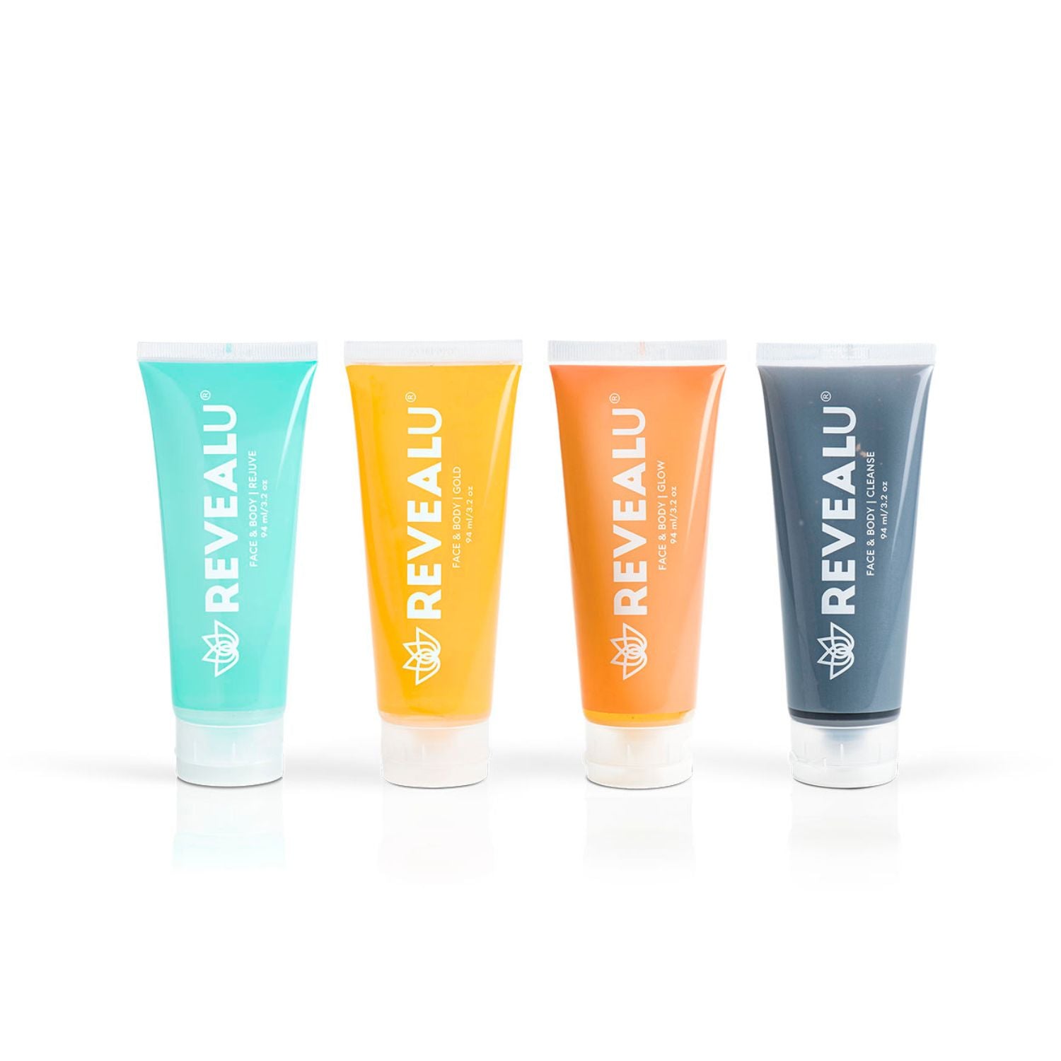 Four tubes of RevealU face and body skincare set displayed in a line