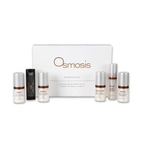 Various osmosis beauty skincare products lined up near box on white background